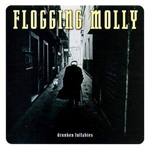 Album cover showing a person walking down a dark, narrow alleyway.