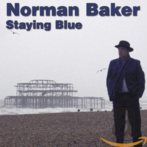 CD cover for Norman Baker’s “Staying Blue” featuring a man by the sea.