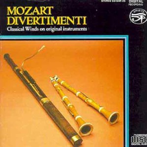 CD cover featuring three vintage woodwind instruments on orange background.