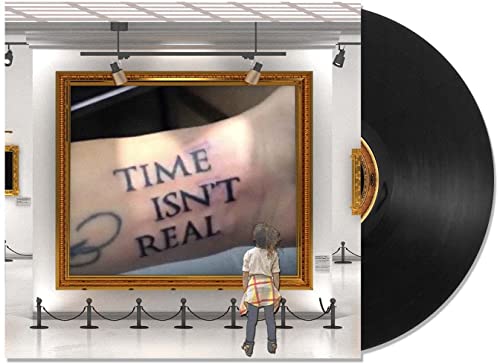 Vinyl record with artwork of a tattooed arm in a gallery setting.