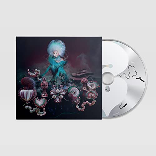 Björk's "Fossora" CD packaging with artist portrait and fungal imagery.