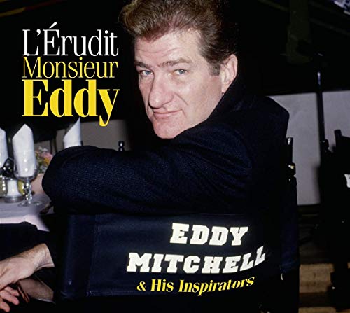 CD cover featuring Eddy Mitchell in a dark suit, smiling slightly.