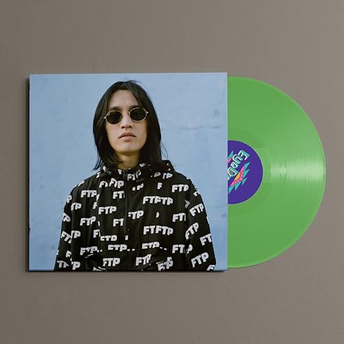 Vinyl record with album cover featuring a man in a hooded jacket.