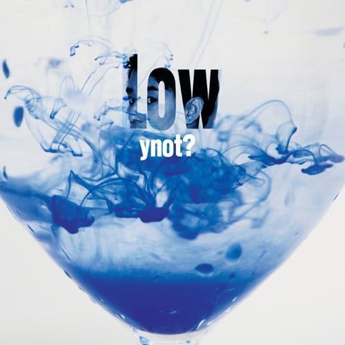 CD cover for “Low” with blue ink swirling in clear liquid.