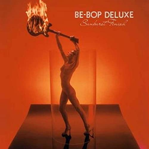 Be Bop Deluxe album cover: nude figure with a flaming guitar.