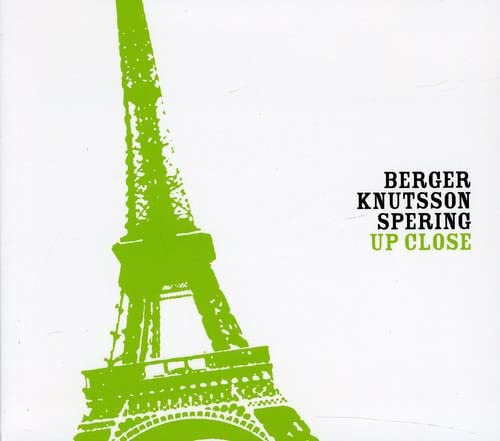 CD cover: green Eiffel Tower silhouette with album title text.