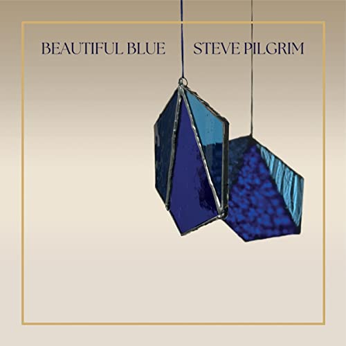 CD cover with stained glass shapes in shades of blue and gold.