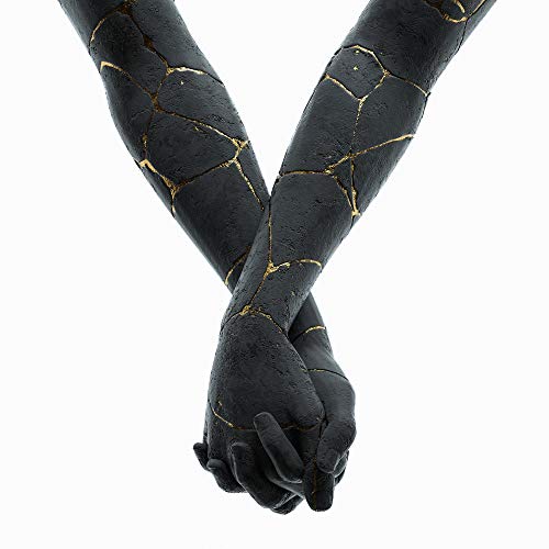 Two dark, cracked arms clasping hands with golden seams, on white.