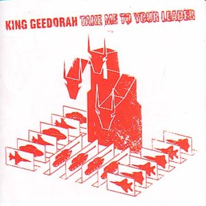 Album cover with red three-headed monster illustration and military vehicles on a white background.