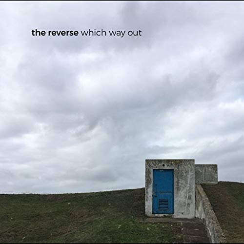 Vinyl album cover: blue door in concrete structure, cloudy sky.