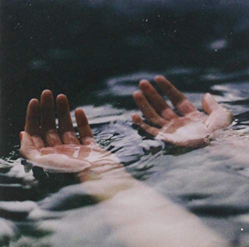 Hands reaching up through dark, rippling water, CD cover art.