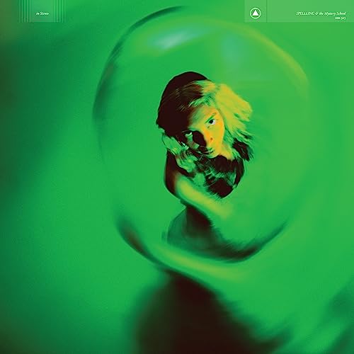 Green album cover featuring a woman inside a translucent bubble.