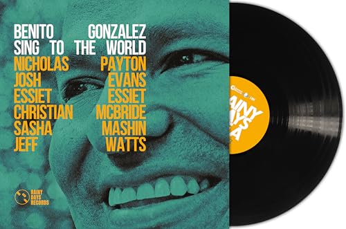 “Sing To The World” vinyl record cover with a smiling face and black disc.