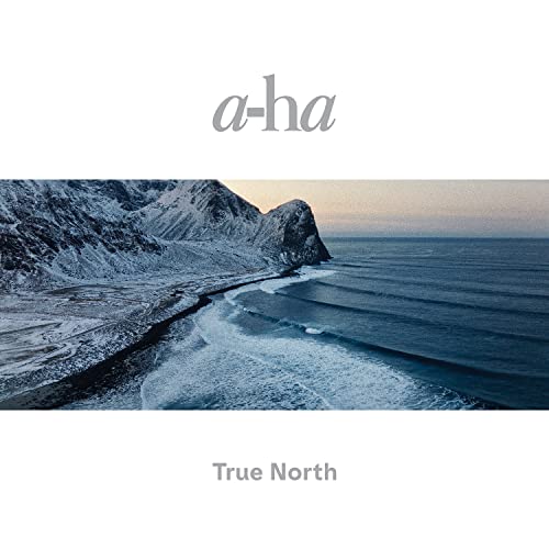 A-ha True North album cover featuring a snowy mountain landscape meeting the ocean.