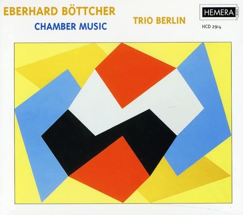 CD cover: abstract geometric design in red, black, yellow, and blue.