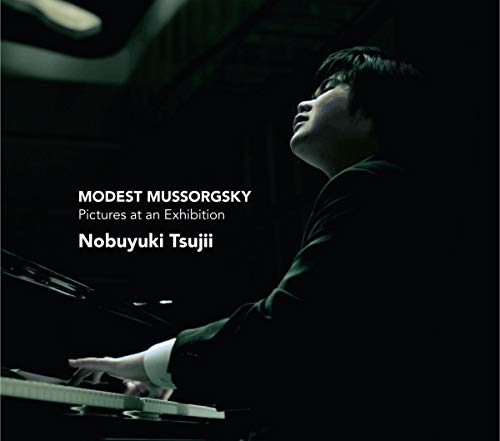 Pianist Nobuyuki Tsujii in profile at a grand piano, dark background.