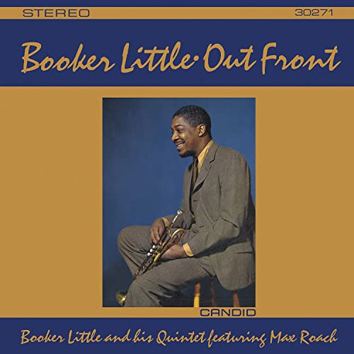 CD cover: Booker Little with trumpet, in a suit, smiling.