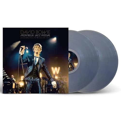 David Bowie album cover and two clear vinyl records shown.