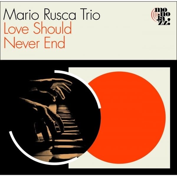 CD cover: piano hands, red circle, text “Love Should Never End”.