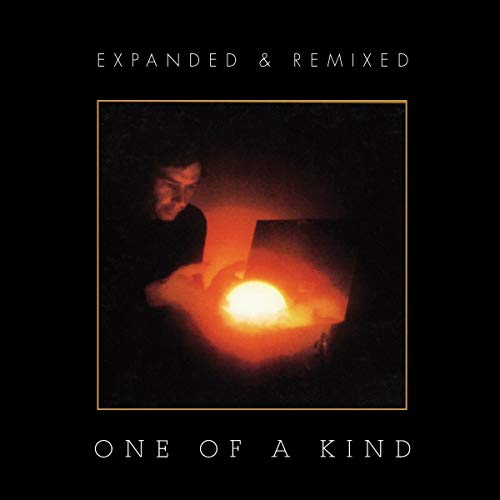 Bruford “One Of A Kind” album cover featuring a man with a light source.