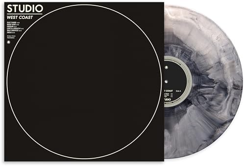 Black album cover with white circle, next to a marbled grey vinyl record.