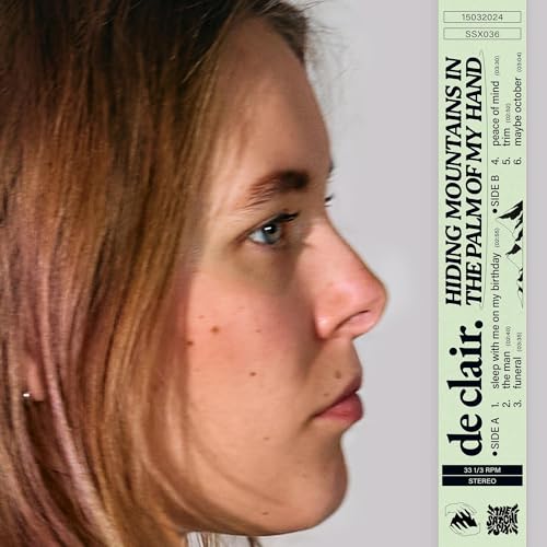 Vinyl record cover featuring a portrait of a woman in profile.