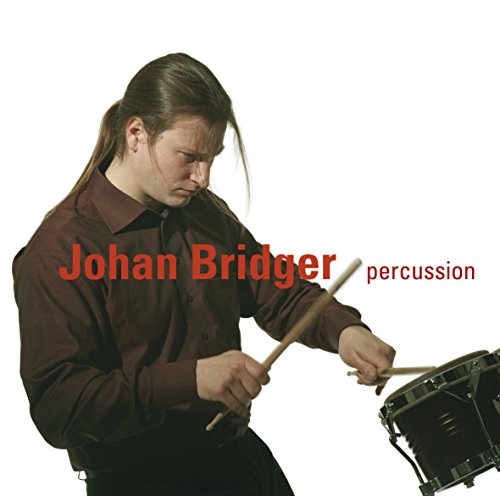 Man playing a black snare drum with drumsticks, album cover.