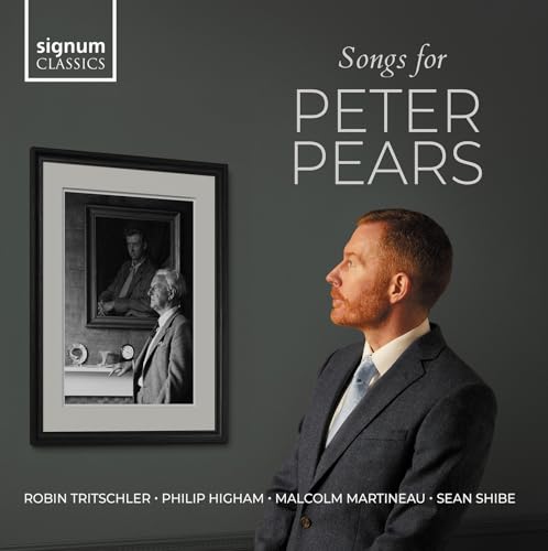 CD cover: man looking at a framed black and white portrait.
