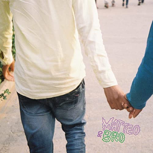 Two people holding hands, seen from the waist down, with album title.