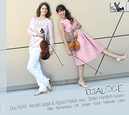 Two women with violins posing against a pale yellow and gray background.