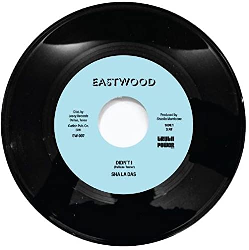 Black vinyl record with a light blue center label reading "Sha La Das - Didn't I".