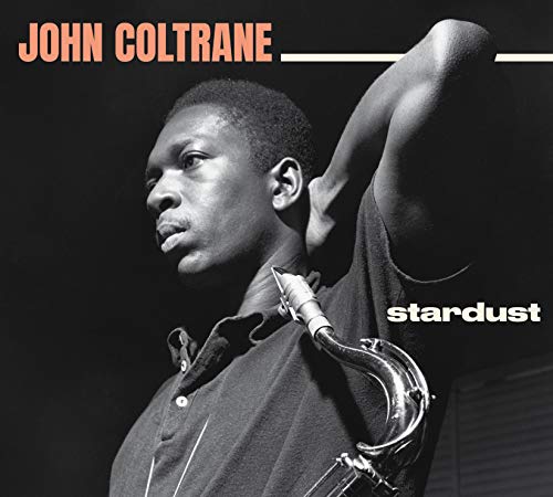 John Coltrane portrait playing saxophone, album cover for "Stardust.