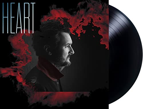 Eric Church Heart album cover featuring a profile portrait with red smoke and vinyl.