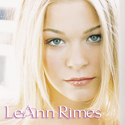 LeAnn Rimes album cover, close-up of blonde woman with blue eyes.