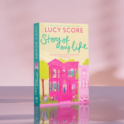 Book cover with illustrated pink Victorian house and teal spine.