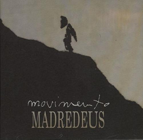 CD cover: Silhouette of a person climbing a hill, text “Movimento MadreDeus”.