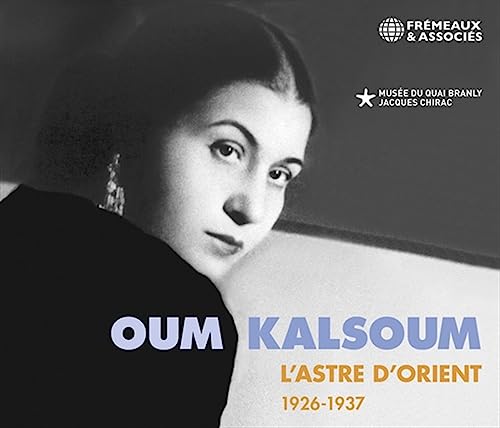 Black and white portrait of Oum Kalsoum, a singer, on a CD cover.