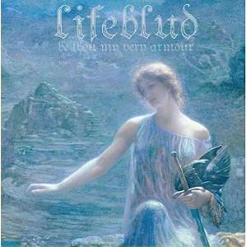 A woman in a flowing dress holds a sword against a misty mountain landscape.