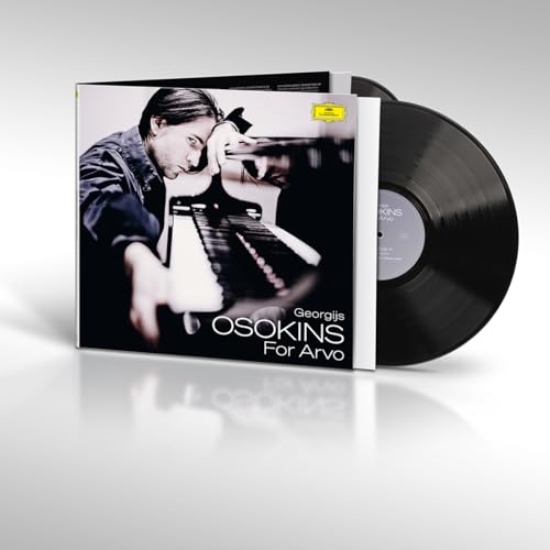 Vinyl record and album cover featuring a musician with an accordion.