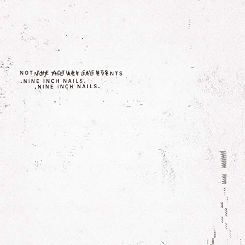 Nine Inch Nails album cover: textured white with dark text and barcode.