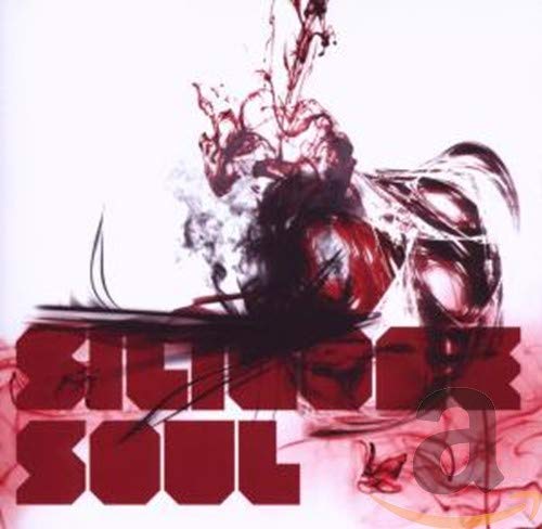 CD cover for "Silicone Soul" featuring abstract red and black imagery.