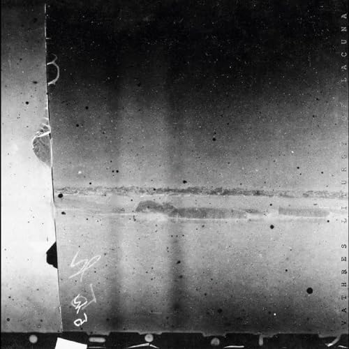 Black and white abstract album cover with textured, grainy details.