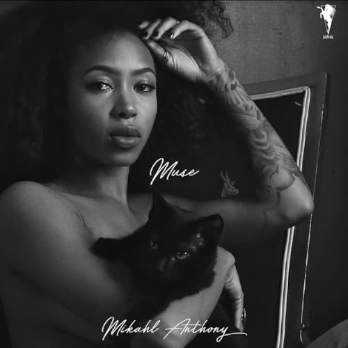 Black and white album cover featuring a woman and a black cat.