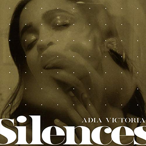 Close-up of Adia Victoria with glitter, album title "Silences" below.