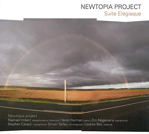 CD cover with a field, rainbow, and stormy sky landscape.