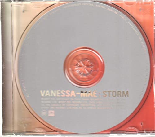 CD case with a gold and red “Vanessa Mae - Storm” disc visible.