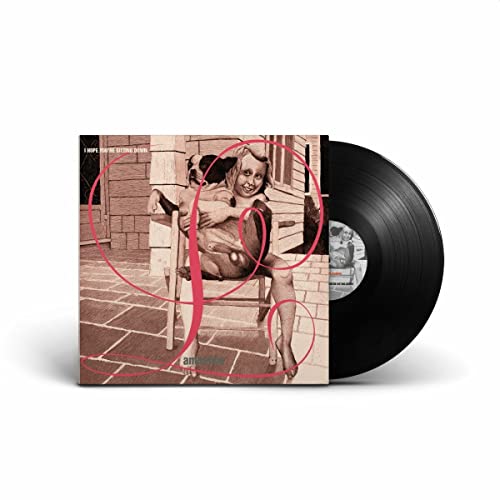 Lambchop album cover with a person and dog, next to a vinyl record.