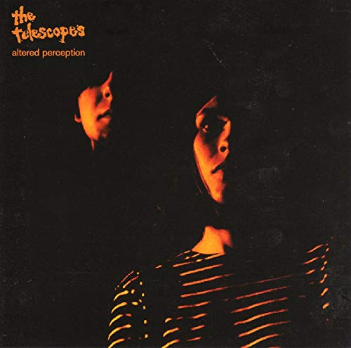 Dark album cover with distorted, shadowed face and band name.
