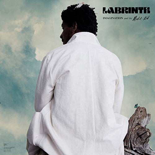A man in a white shirt looks away against a cloudy sky background.