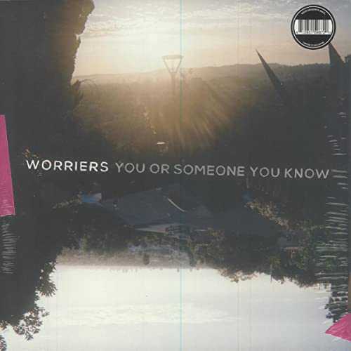 Vinyl record cover with landscape, text, and a barcode in the upper right.